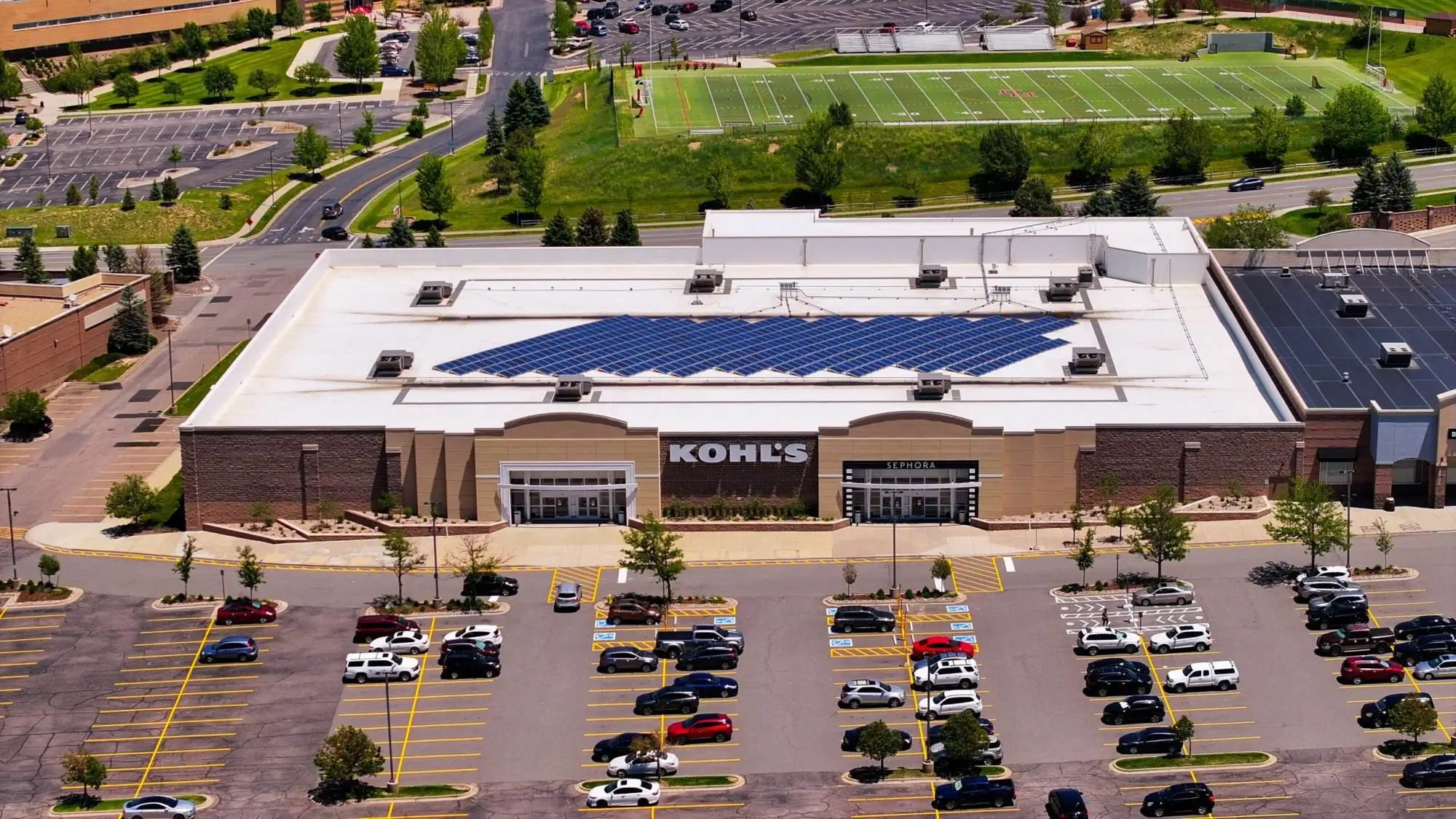 Commercial solar panel removal and reinstallation project at Kohl's retail location during roof replacement by Vanguard Solar Services.