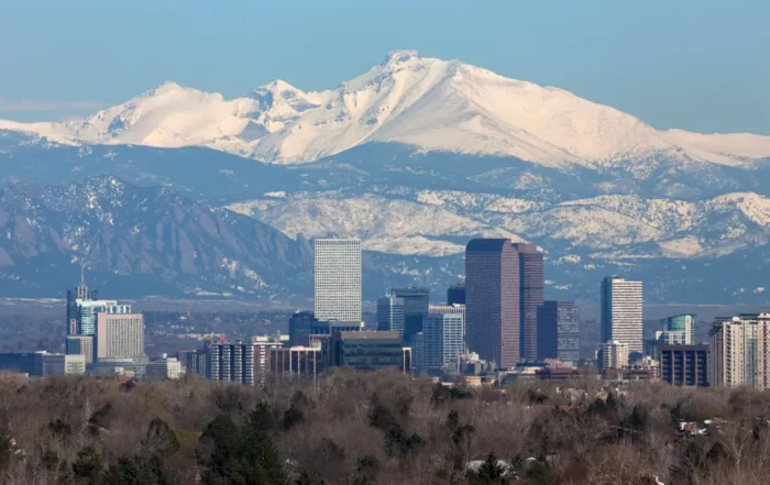 Commercial rooftop solar panels helping a Denver building meet Energize Denver energy performance requirements.