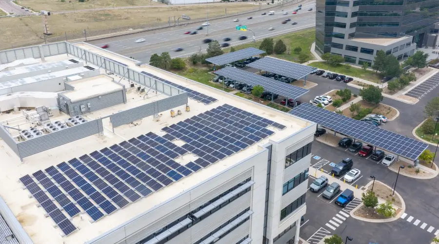 Aerial view of multiple solar carport structures at the 169 Inverness commercial property