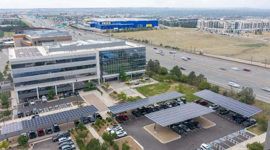 Solar carport array at 169 Inverness in Englewood near I-25