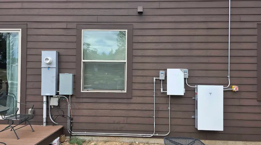 Tesla Powerwall home battery installed on the exterior of a Colorado residence