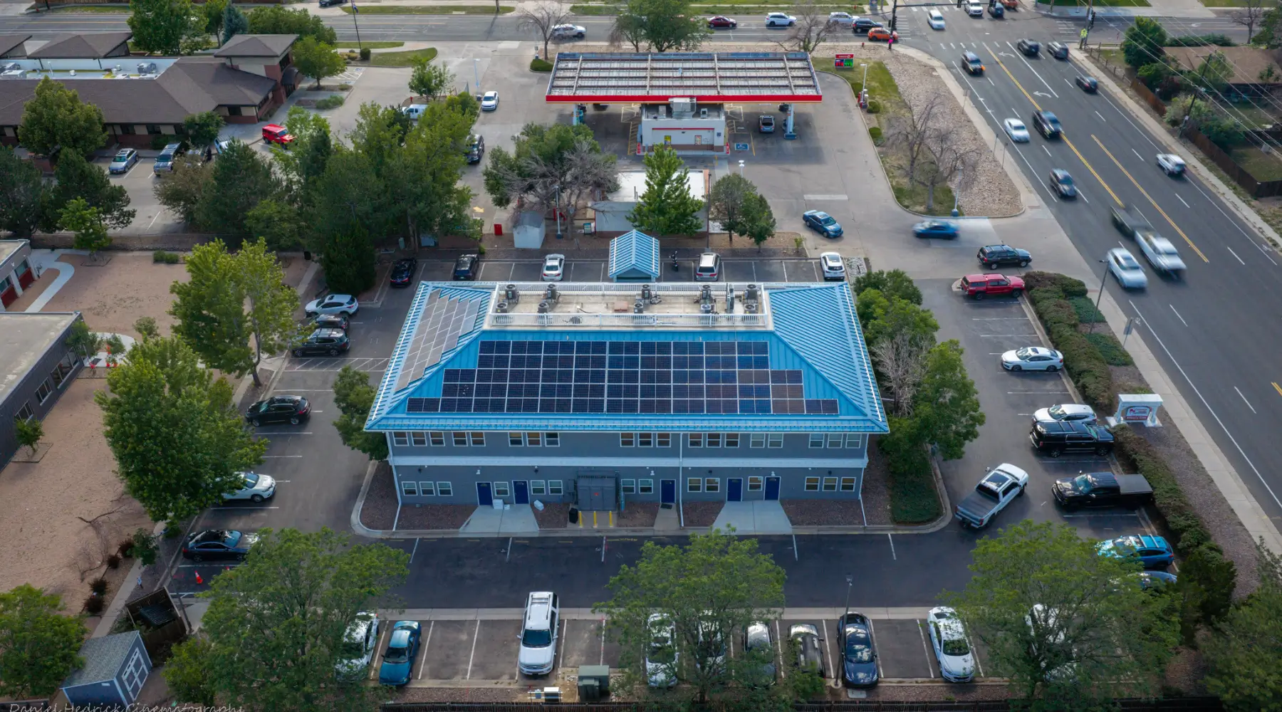 Solar panels installed on the standing seam metal roof at Partners In Health in Westminster, Colorado
